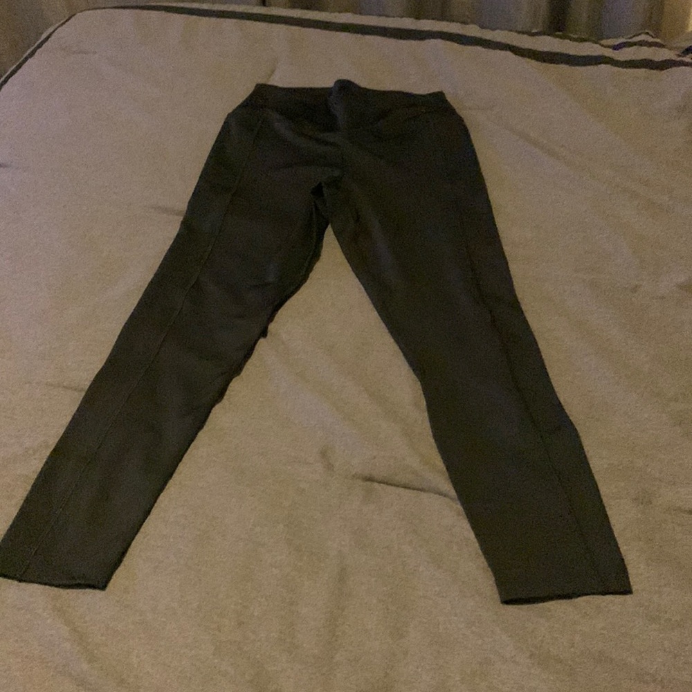 Pink black leggings is size medium